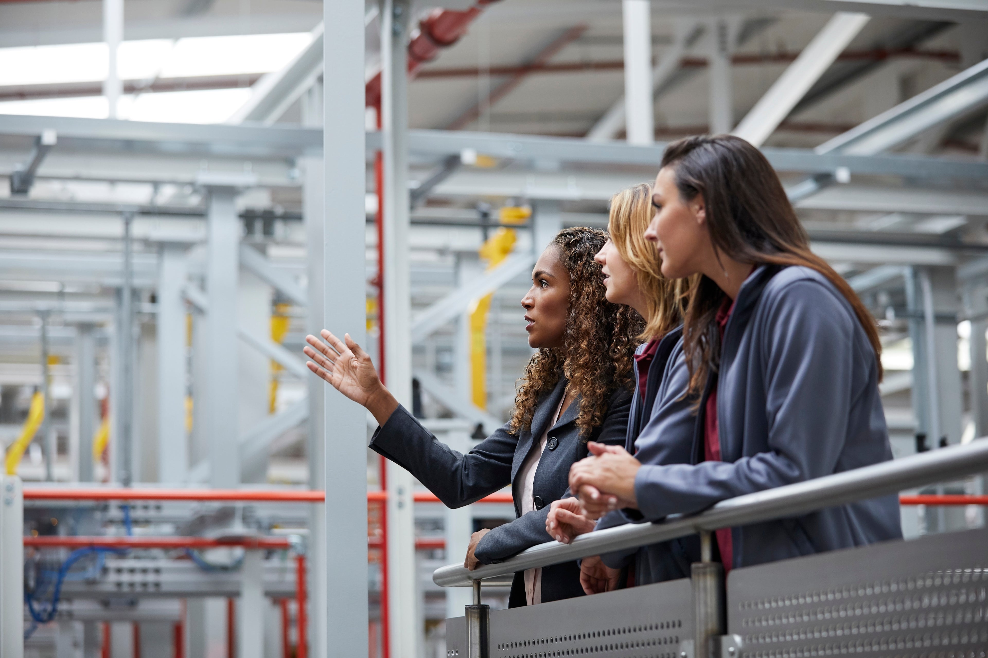 Women working in a factory, symbolizing real-world application of Lean principles in operational settings.