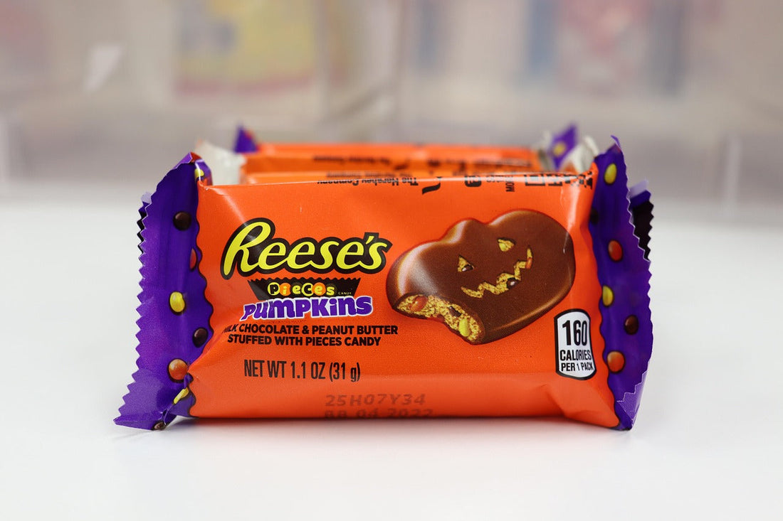 Chocolate and peanut butter colliding, symbolizing the fusion of Lean and Agile principles for operational excellence.
